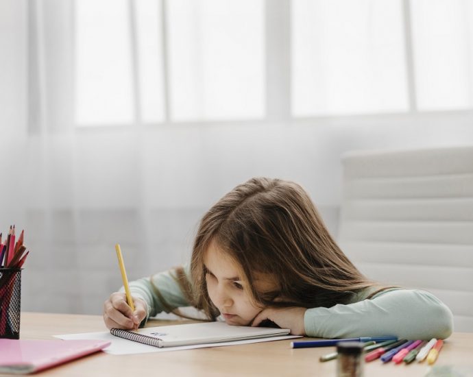 A girl taking notes