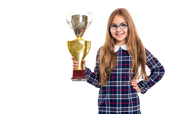 photo of happy excellent school girl with award. excellent school girl with award isolated on white background. excellent school girl hold award in studio. school girl winning excellent award.