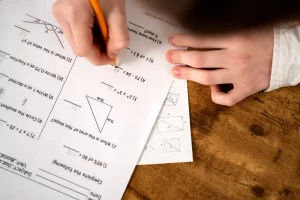 Top view of kids taking a test