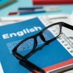 A booklet with the word English and eye glasses on it