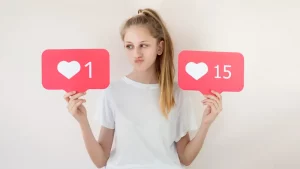 A girl comparing likes, 1 vs 15.