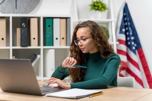 A girl studying on a laptop