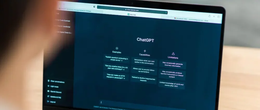 A laptop showing ChatGPT