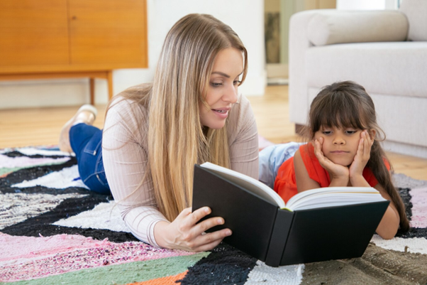 Woman reading with child